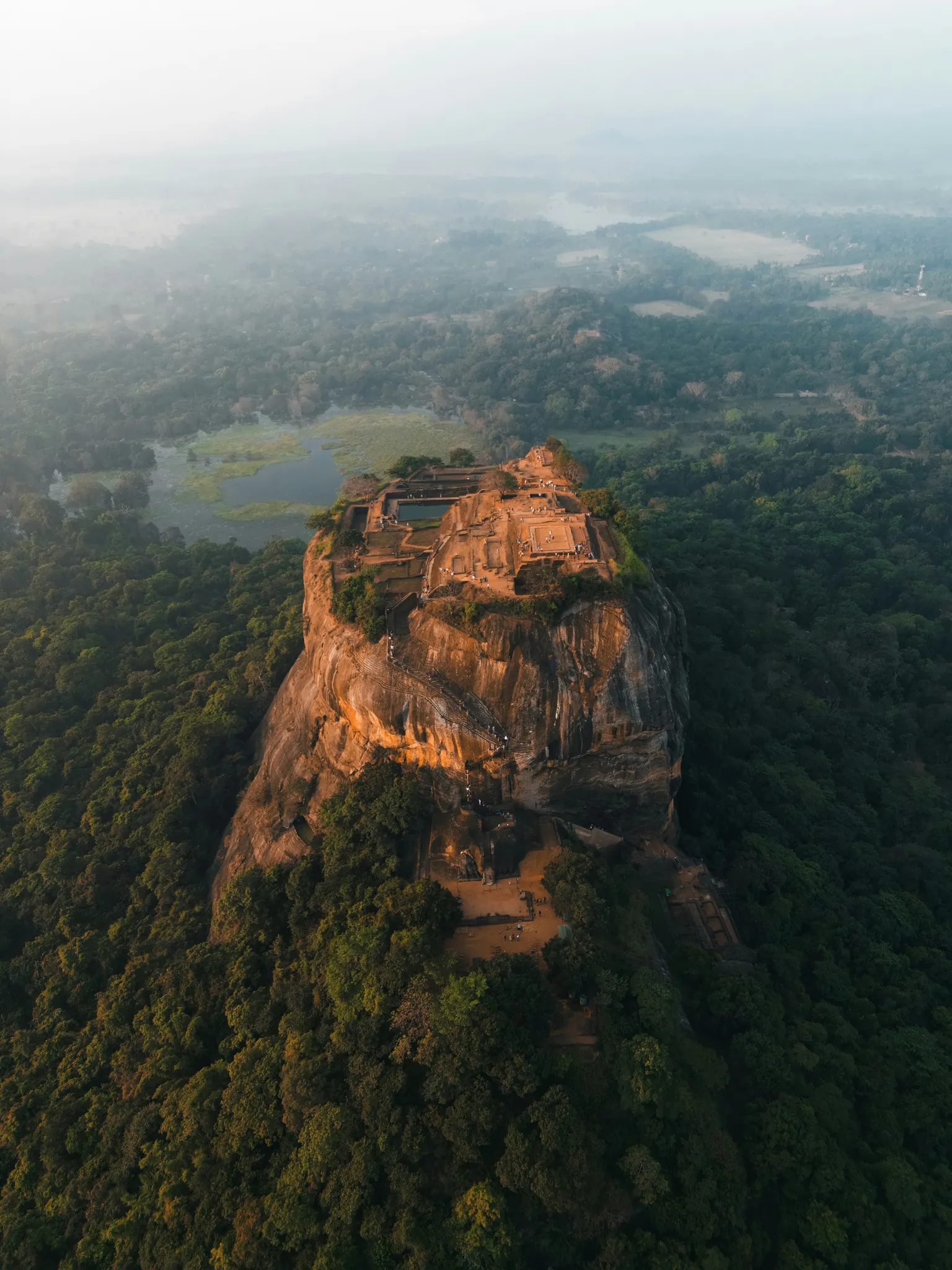 Sigiriya Rock rising above the green landscape