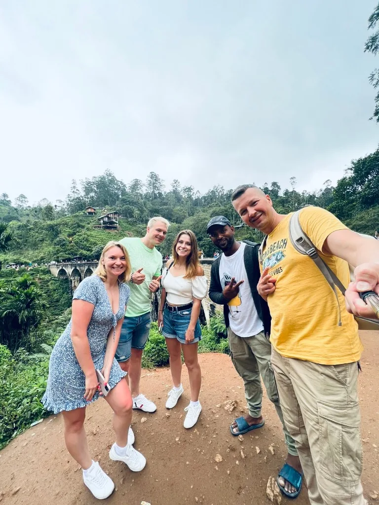 Guests and their local guide at Nine Arch Bridge in Ella