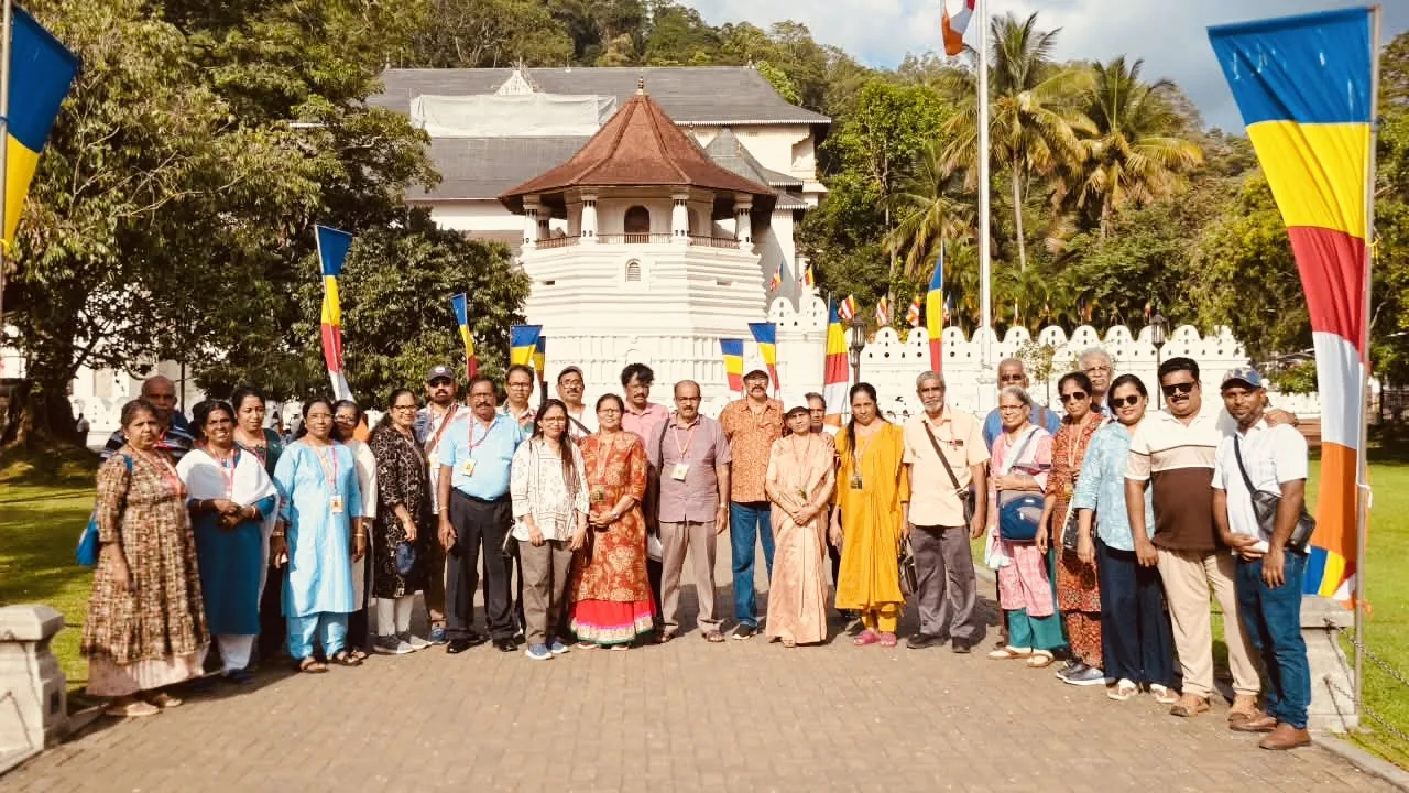 A group of travelers visiting a temple in Kandy